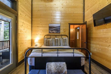 Cozy nights with our sleek flat-screen on the wall.