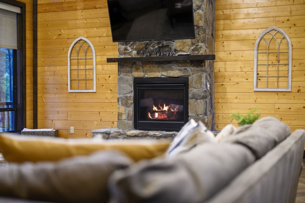 Cozy evenings by our stone wall fireplace.