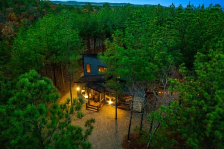 The Unplugged Cabin nestles in tranquil seclusion within the heart of the woods.