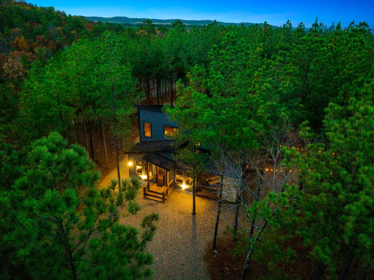 The Unplugged Cabin nestles in tranquil seclusion within the heart of the woods.