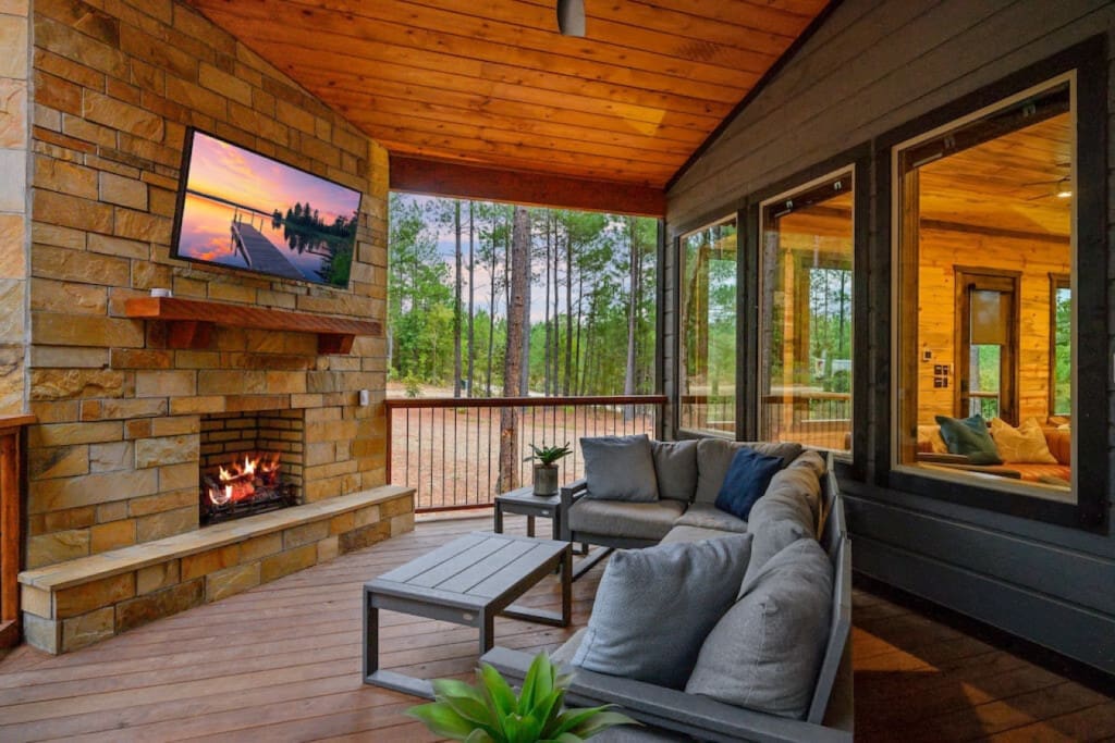 Enhance your family gatherings with an outdoor fireplace and smart TV.