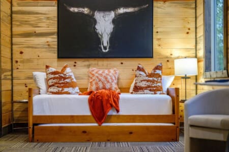 Unplugged's twin daybed with a trundle, offering the perfect spot to relax.