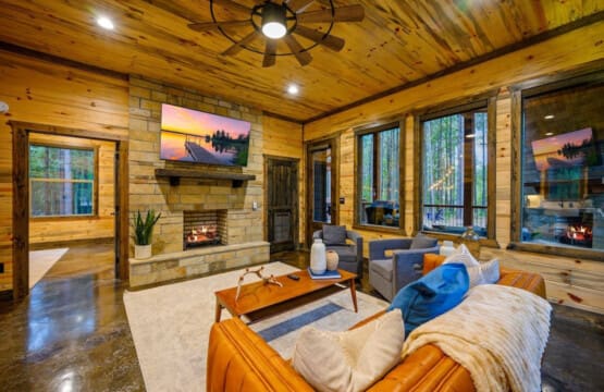 Relax in the cozy embrace of Unplugged's living room, complete with a smart TV for entertainment and an indoor fireplace that adds a touch of warmth.
