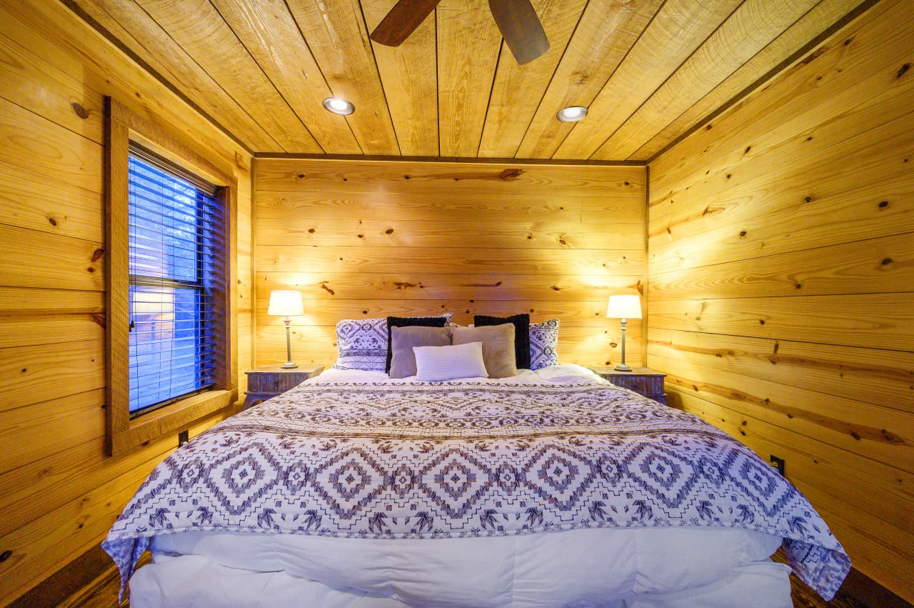 Daydream Chalet bedroom Rustic retreat for dreams.