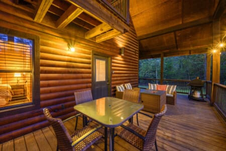 Immerse yourself in the enchantment of our expansive patio adorned with stylish outdoor furniture and a grill, where the magic of al fresco living comes to life.