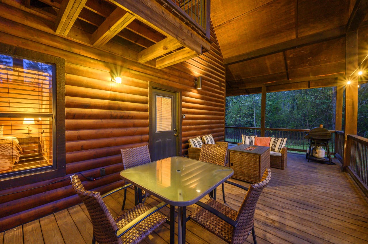 Immerse yourself in the enchantment of our expansive patio adorned with stylish outdoor furniture and a grill, where the magic of al fresco living comes to life.