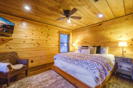 Experience serene relaxation in Daydreams Chalet's two expansive king bedrooms, ensuring a restful night's sleep in a haven of tranquility.