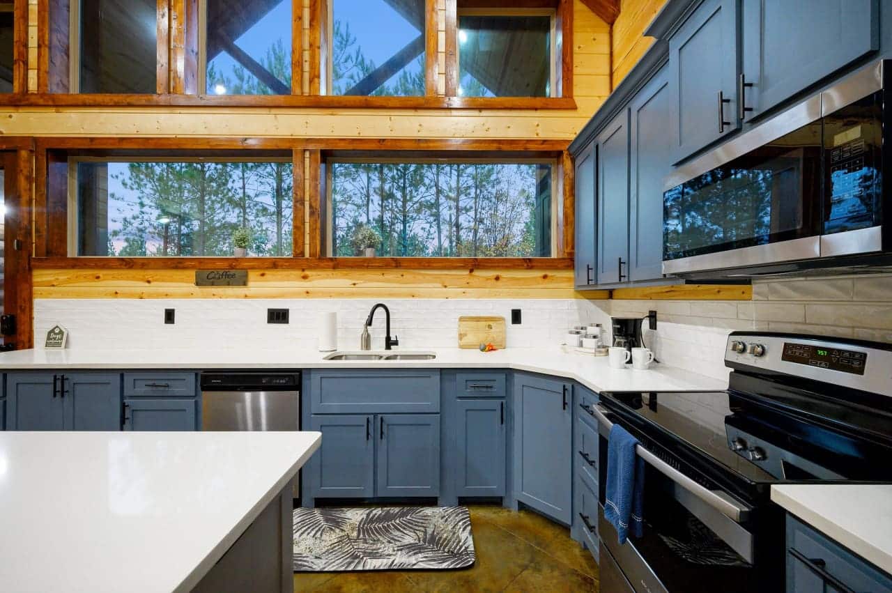 Rustic flavors, modern comforts: Explore the heart of our cabin in the kitchen.