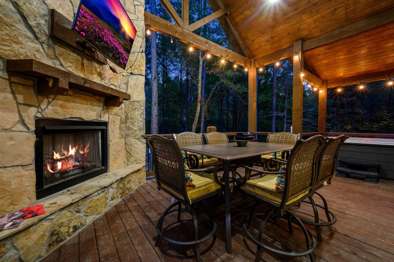 Snuggle up by the Chillax Inn outdoor propane fireplace, creating a cozy and enchanting atmosphere beneath the stars.