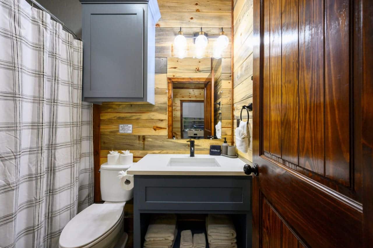 Rustic charm meets modern convenience: Step into our cabin washroom.