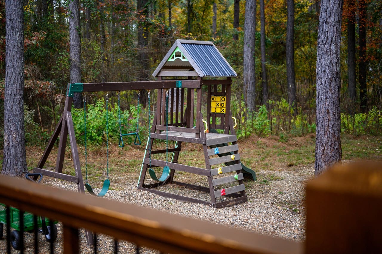 Explore, play, and make memories in our whimsical cabin playground.