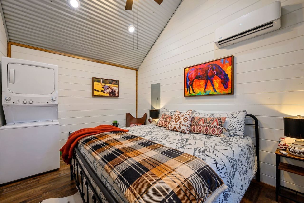 Amidst the plush pillows and cozy layers, this bed is not just a place to rest; it's a sanctuary where tired souls find respite and dreams come to life in the soft glow of night