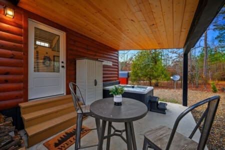 Our outdoor cocktail table near the hot tub is the perfect spot to enjoy refreshing drinks and lively conversation.