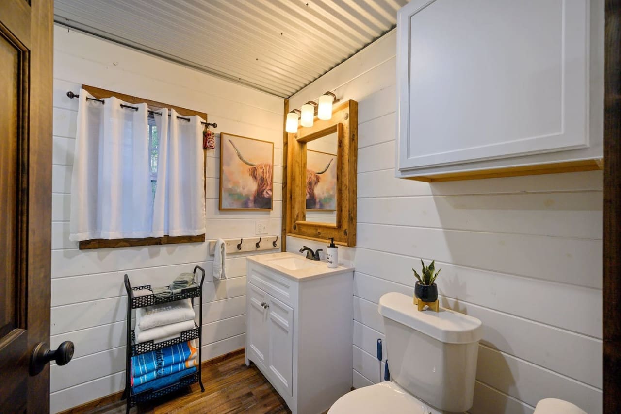 Rustic allure, modern amenities – our perfect bath blend.