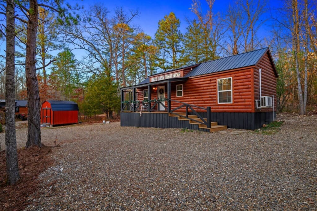 Behold the enchanting outside view of our cabin, where majestic landscapes and tranquil surroundings invite you to reconnect with the great outdoors.
