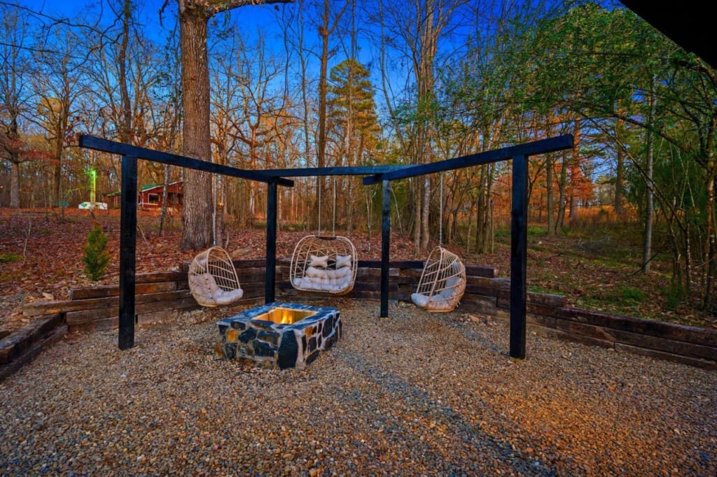 Swaying under the stars, warming by the fire – where swing meets serenity.