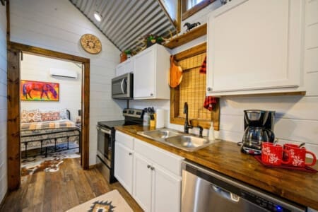 Rustic charm meets culinary delights in our cabin kitchen.