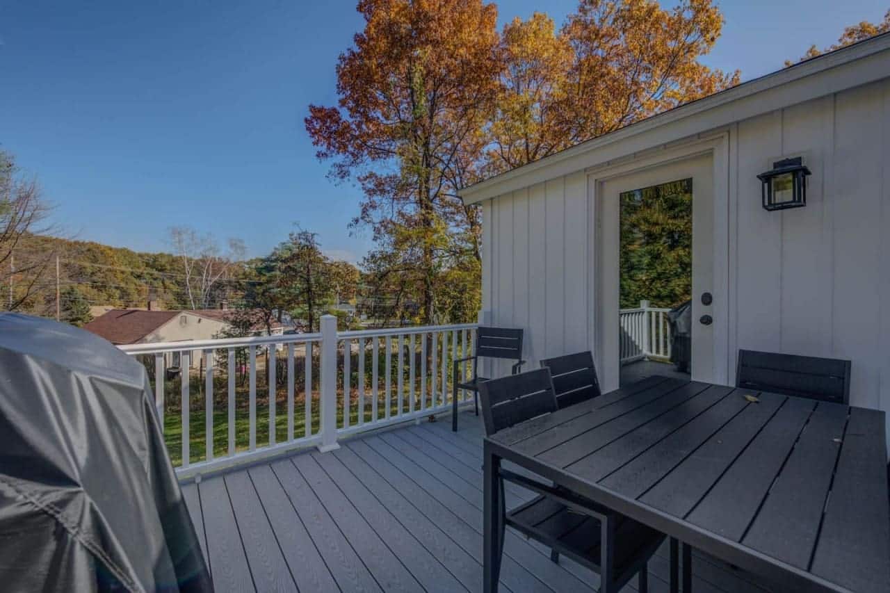 Breathe in the crisp air from this inviting open porch.