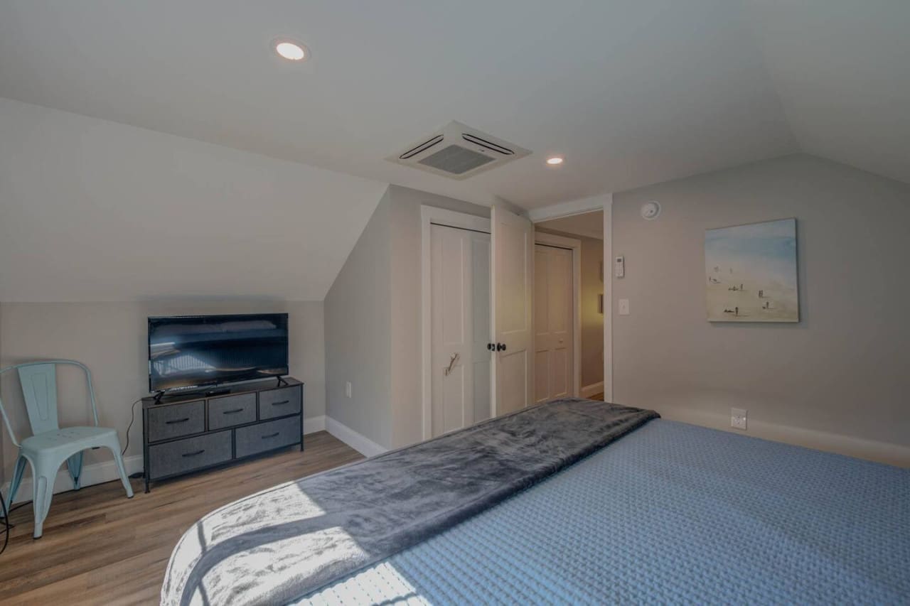Our comfy bedroom, where plush bedding and serene ambiance invite you to unwind and embrace peaceful slumber.
