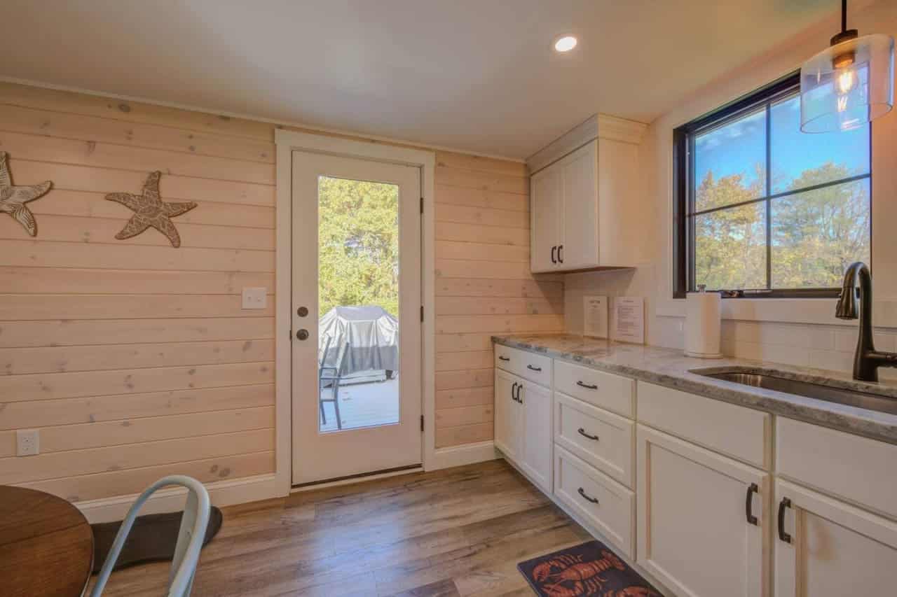 A modern twist on rustic charm with clean white lines.