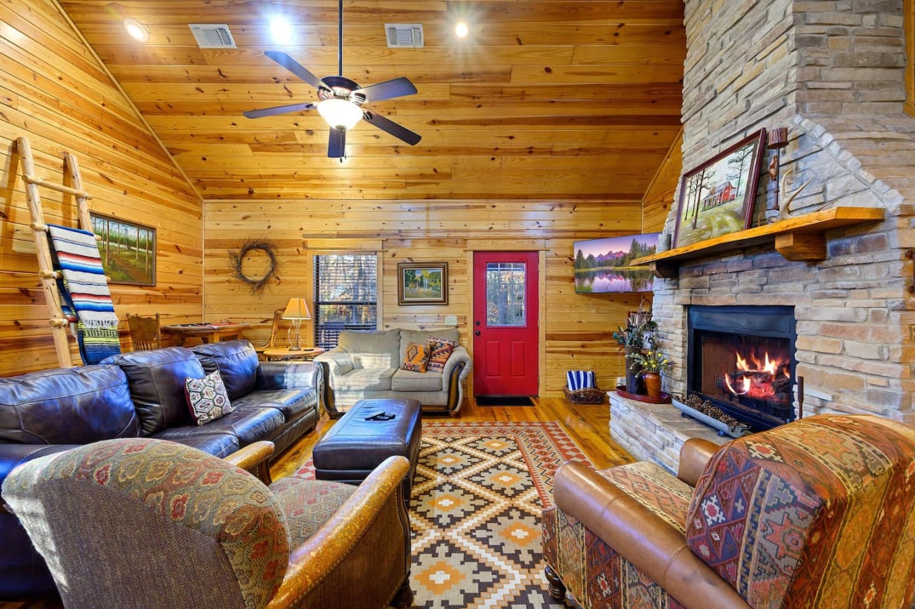 Where relaxation meets rustic charm in the cabin's living space.