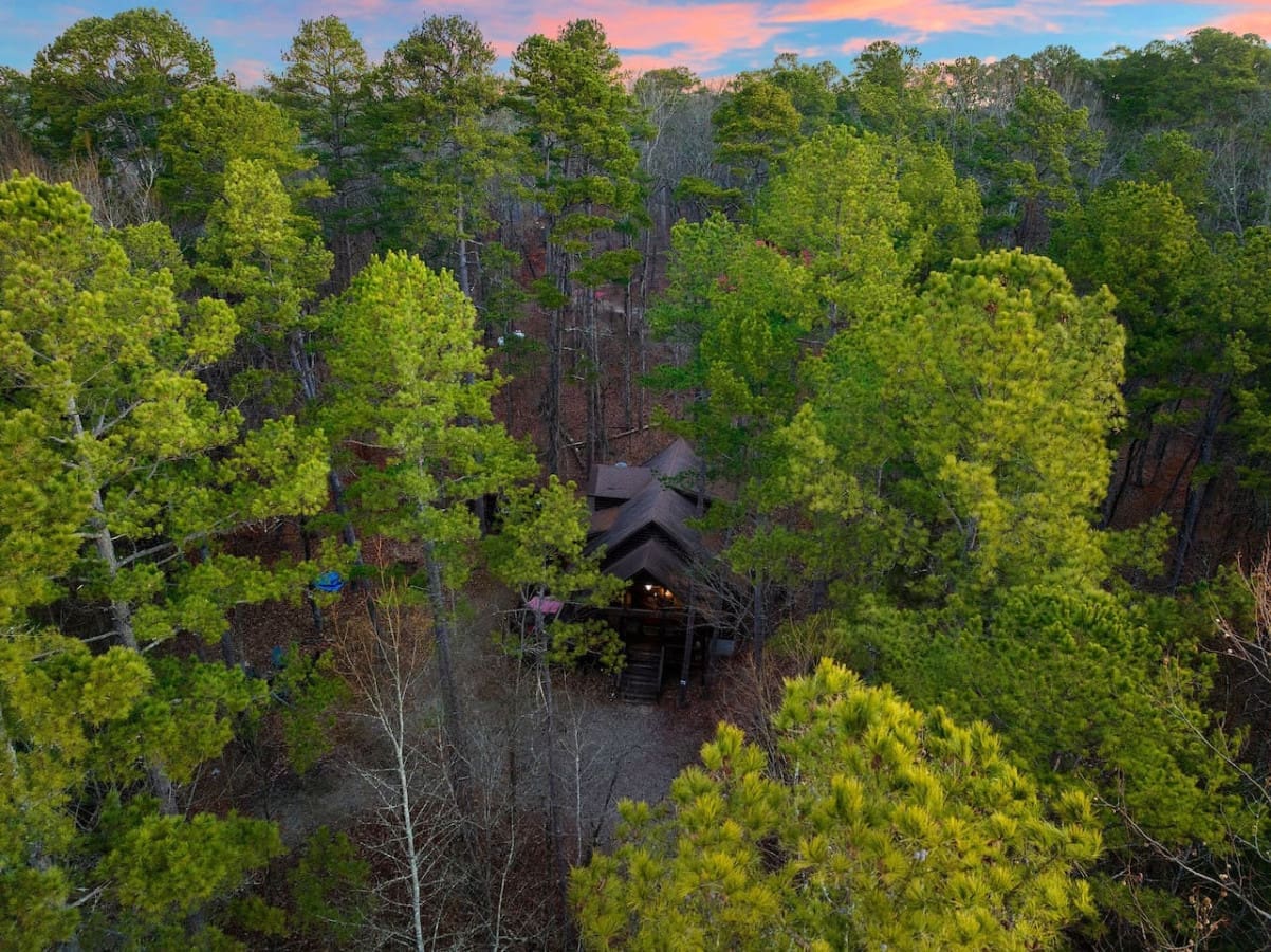 Escape to nature's sanctuary with our cabin view, offering a glimpse of the beauty that surrounds us.