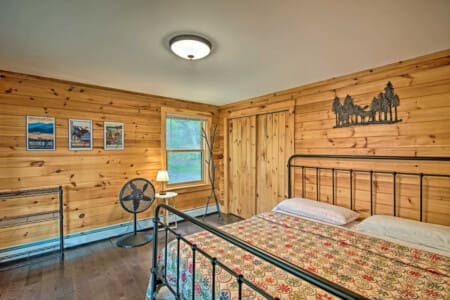 Whispering Woods: Where Wooden Walls and Fans Lull You into Peaceful Slumber