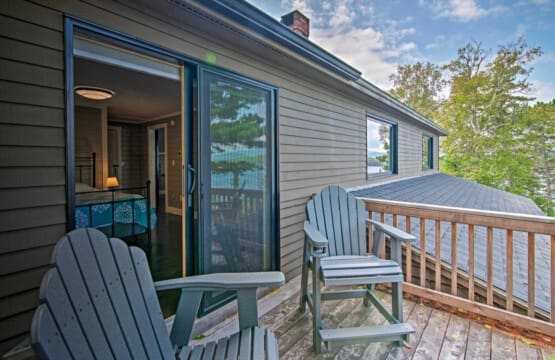 Woodland Retreat: Where Grey Rocking Chairs Set the Stage for Outdoor Tranquility