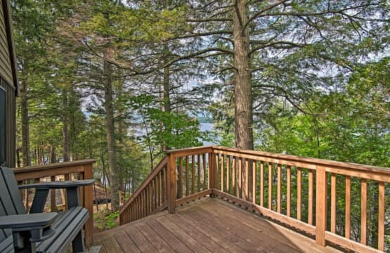 Balcony to Below: Where Wooden Stairs Extend the Invitation to Explore