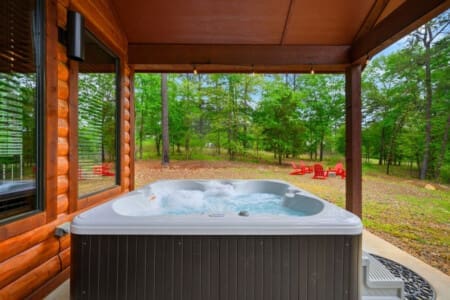 Escape to tranquility with a soak in our cabin's hot tub