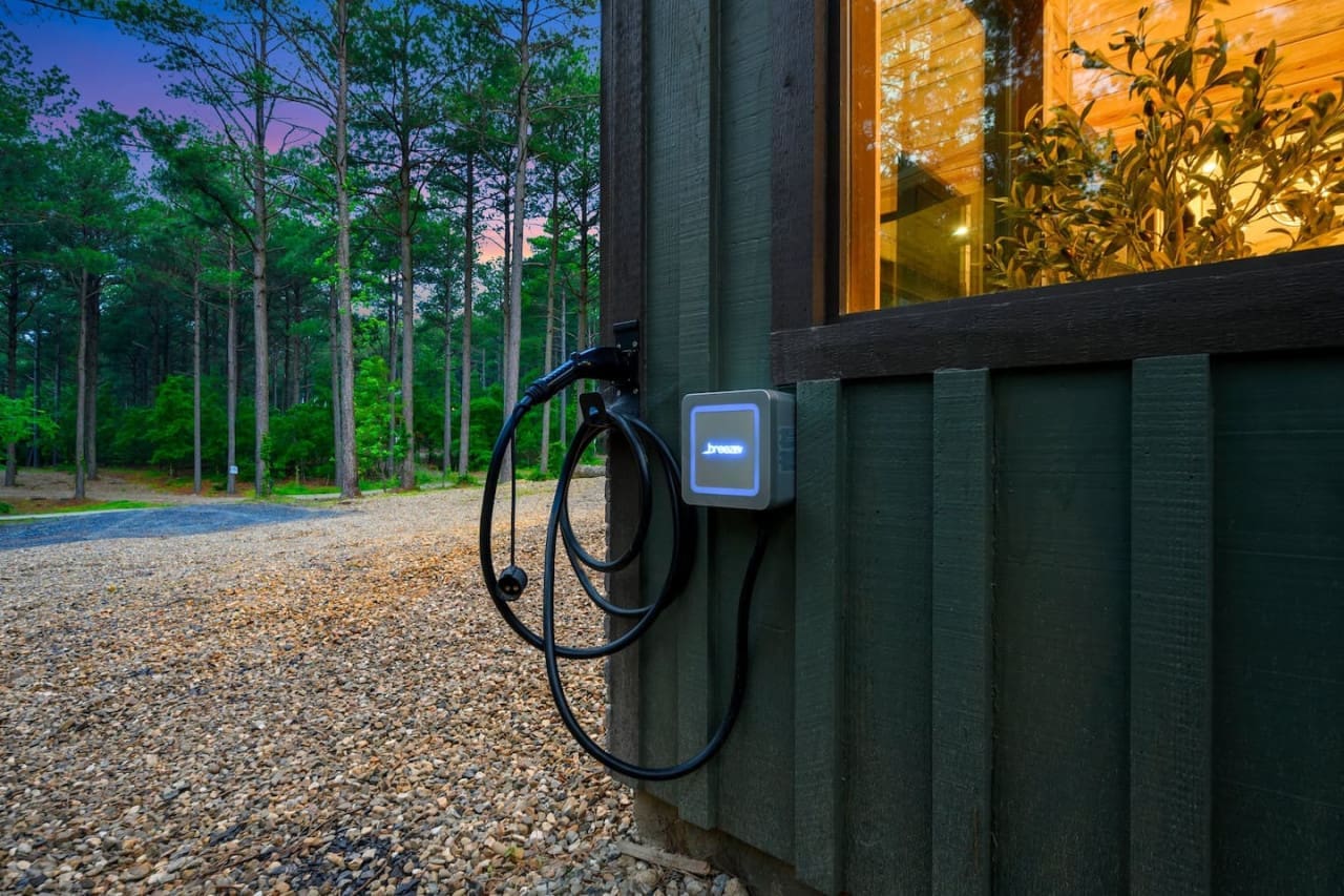 Ready to go electric? Our cabin's got you covered with a convenient EV charging station right at your doorstep.