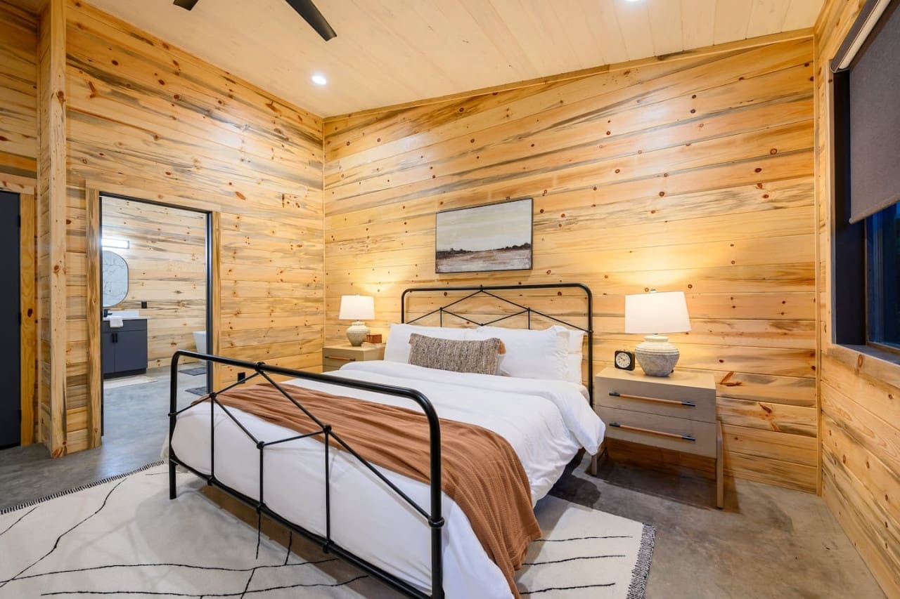 Rustic tranquility in our cabin's cozy bedroom.