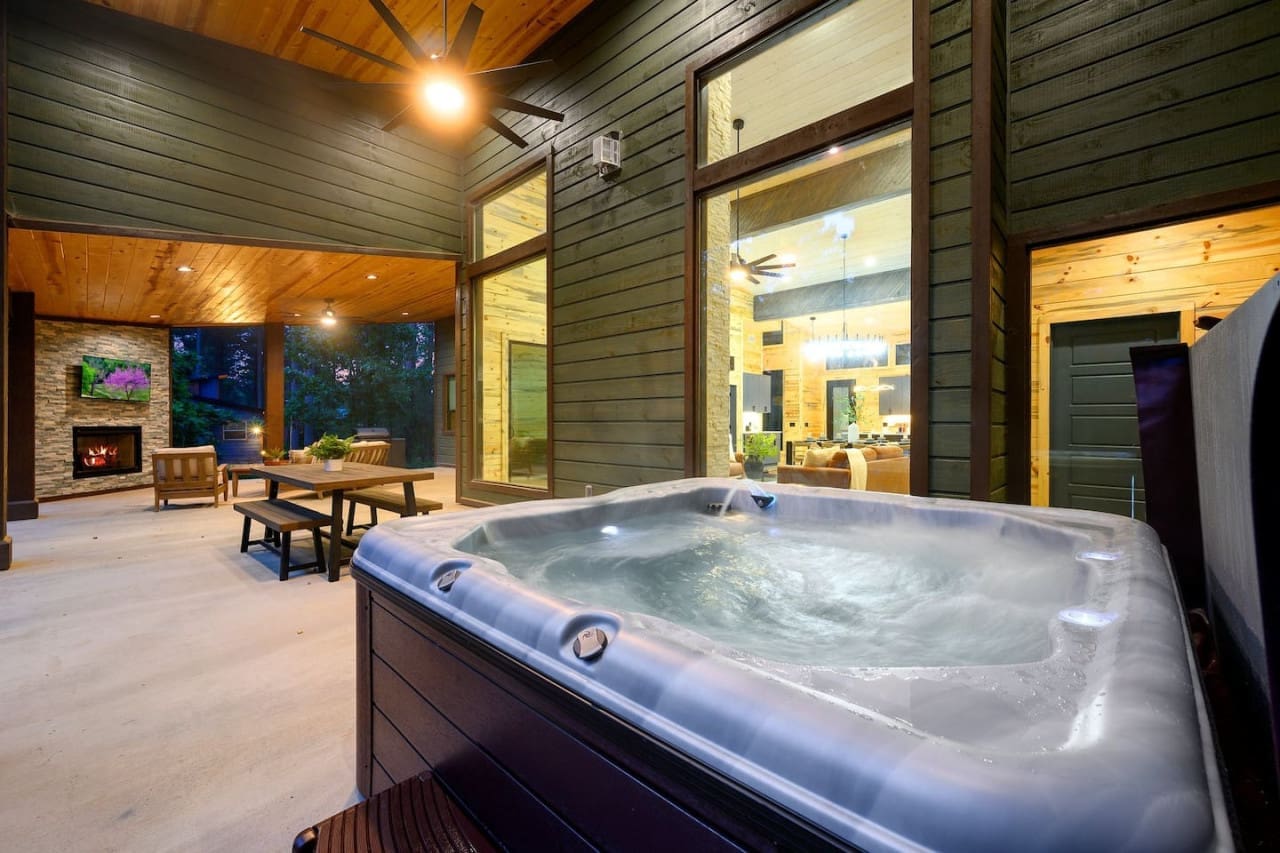 Escape to tranquility: unwinding in our cabin's hot tub oasis.