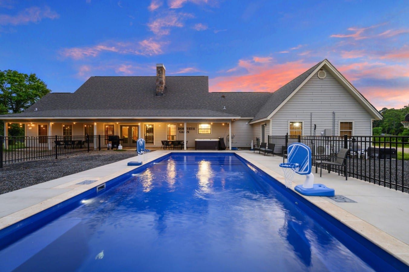 Pool view facing the cabin and covered patio.