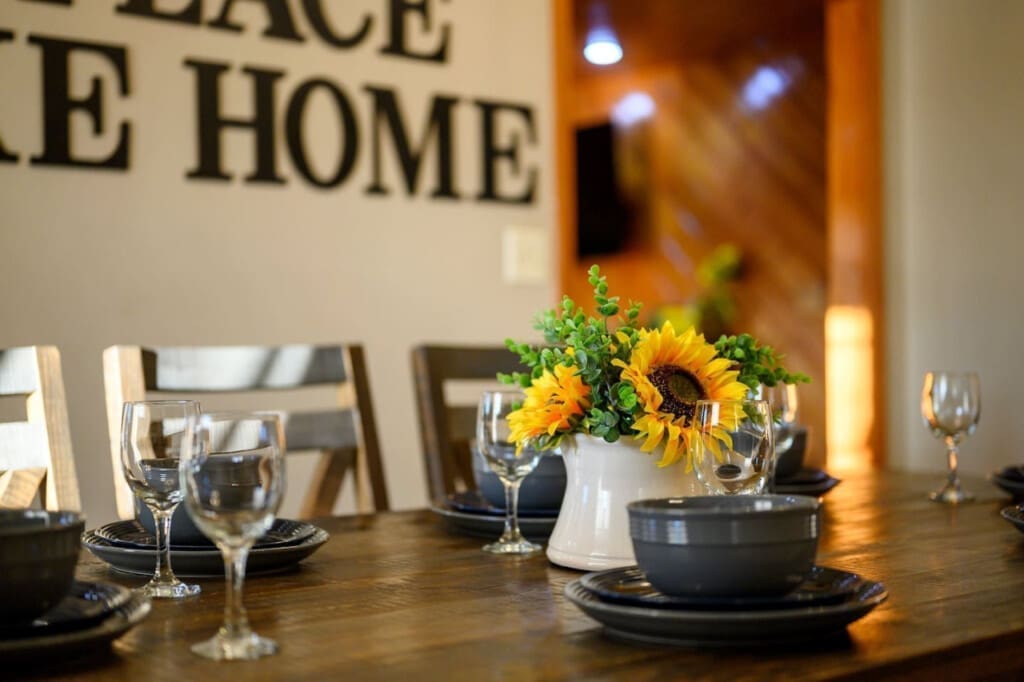 Elevate your dining experience with a beautifully set table, ready for memorable meals and cherished moments.
