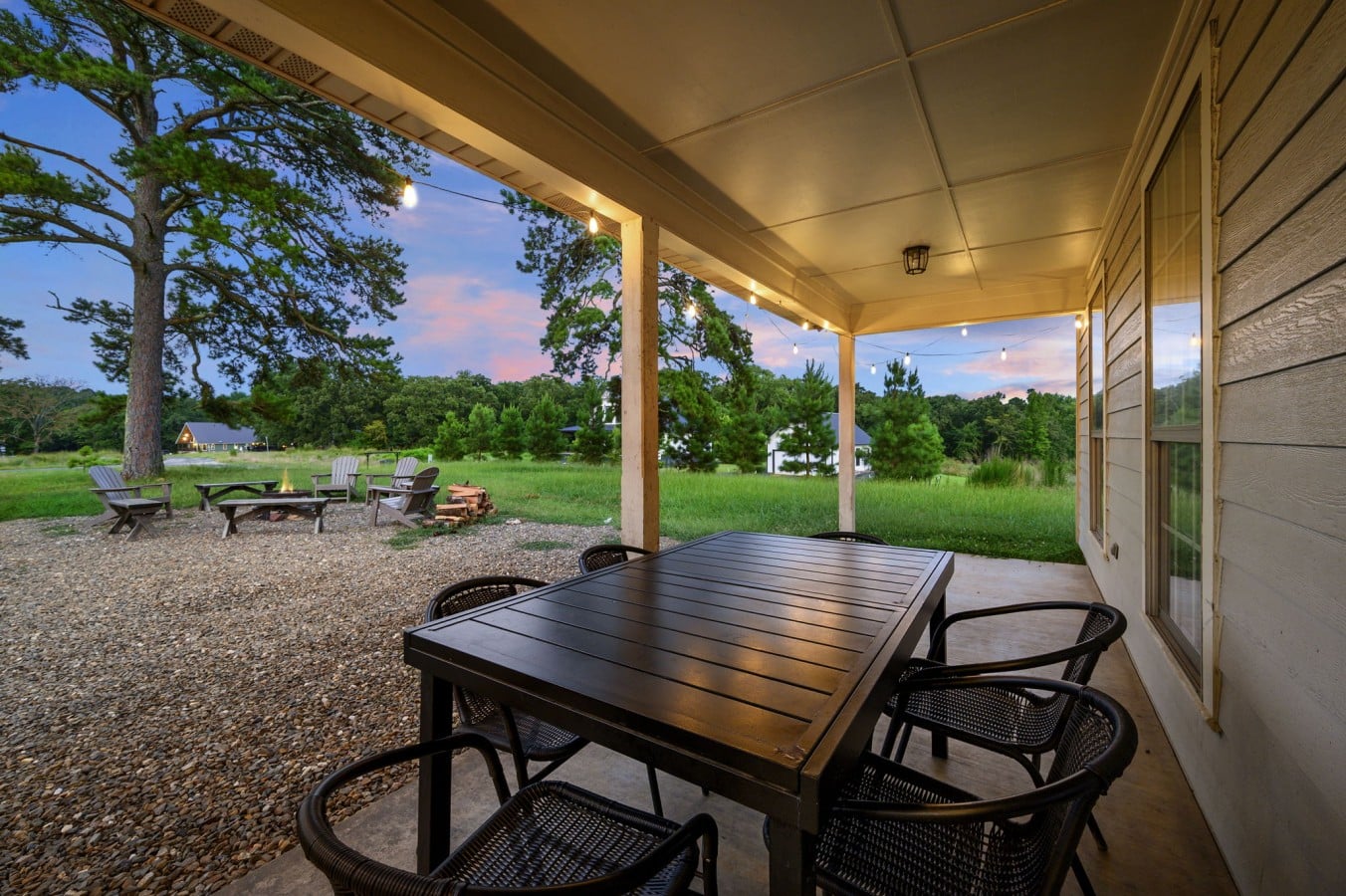 Covered patio table looking out over the yard.