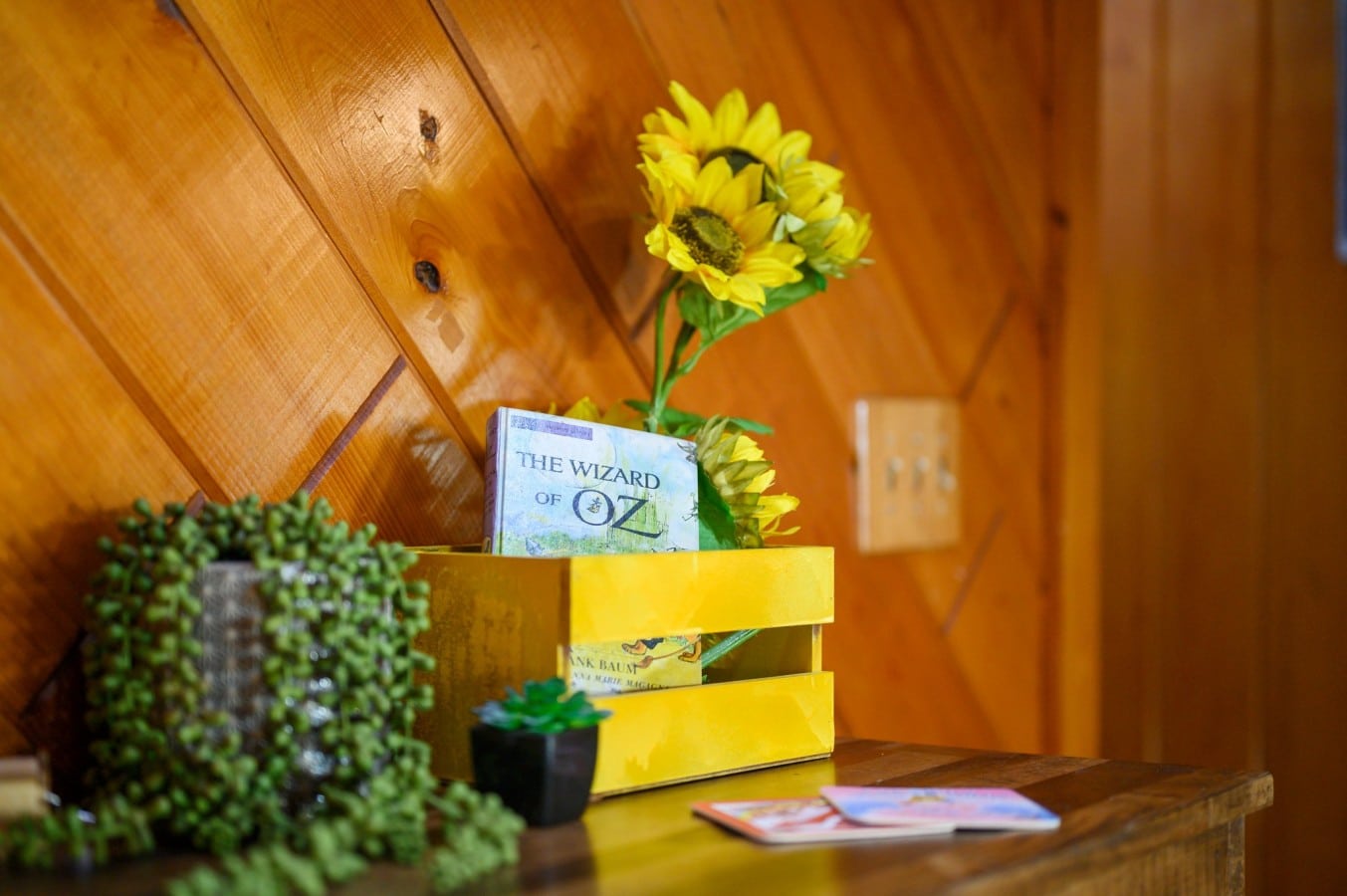 Cheerful bedroom detail with Dorothy-inspired decor.