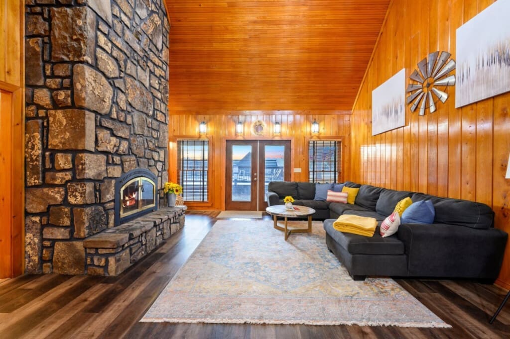 Cozy up to the rustic elegance of our stone wall fireplace, where warmth and charm meet.