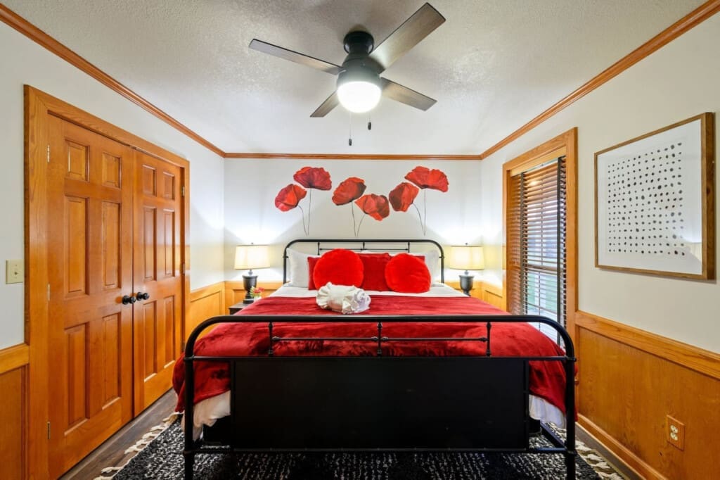 Unwind in style—our cabin bedroom blends rustic elegance with modern comfort.