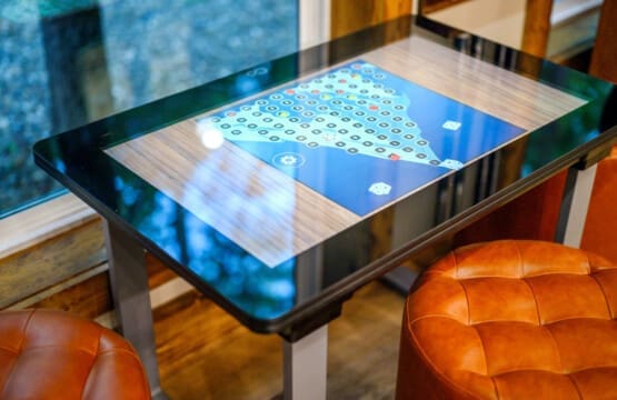 Game on! Our electronic game table brings the thrill of arcade action right to your living space.