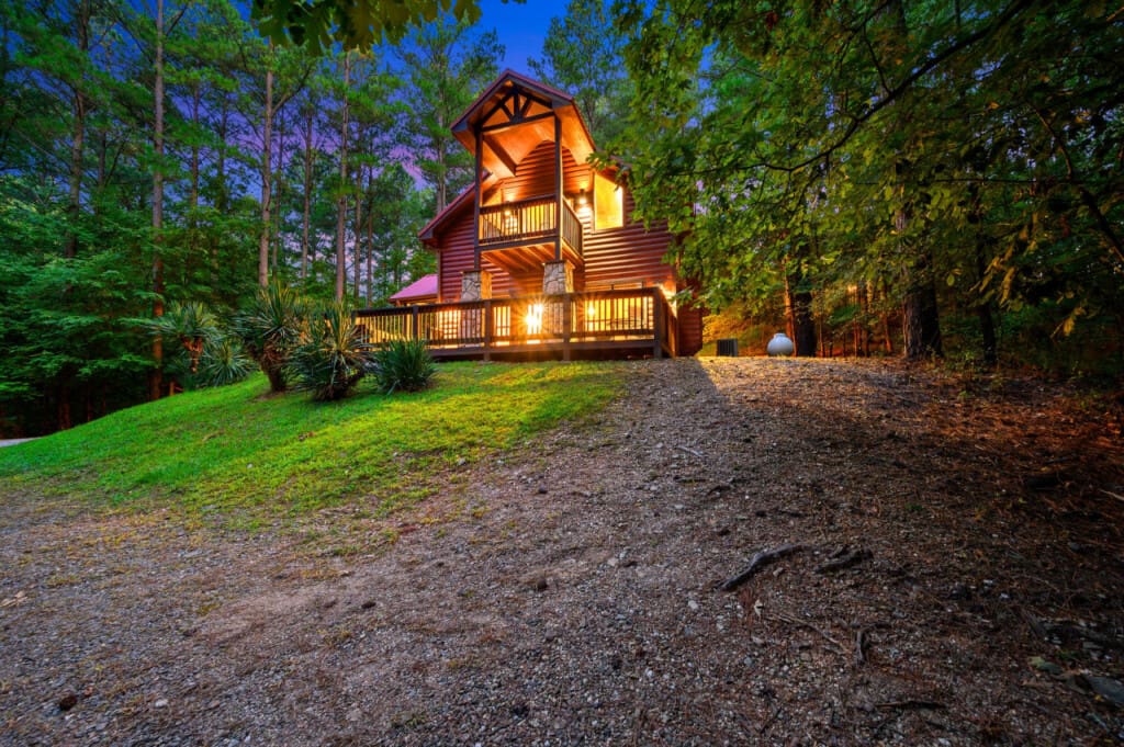 Discover the rustic charm of our cabin’s front view, nestled in nature’s embrace.