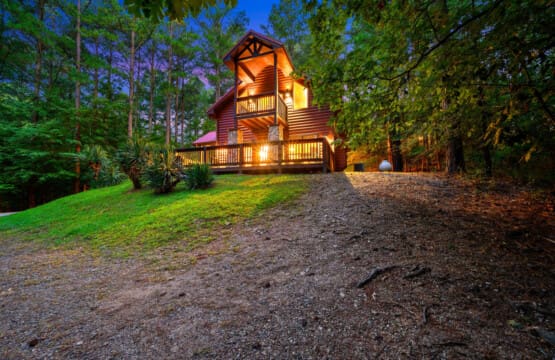 Discover the rustic charm of our cabin’s front view, nestled in nature’s embrace.