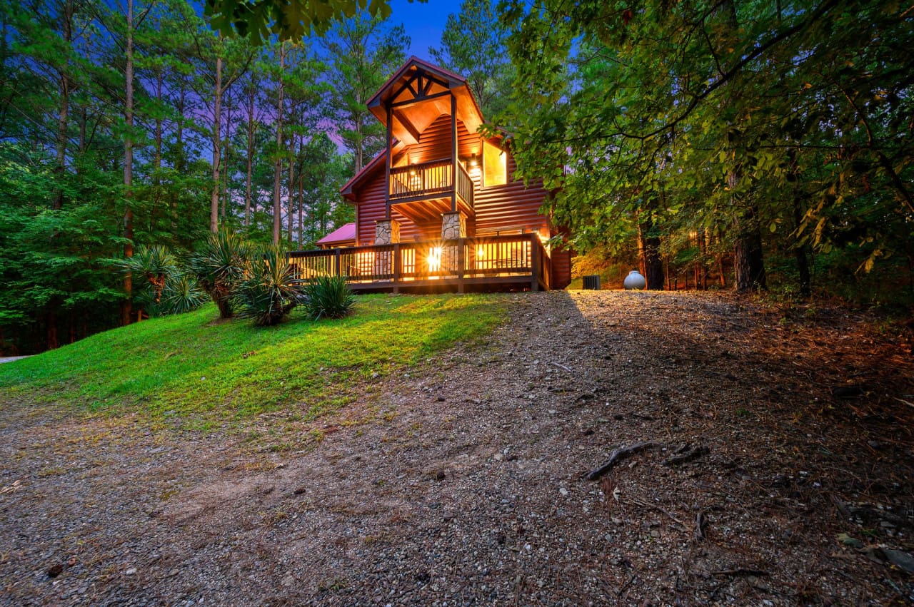 Discover the rustic charm of our cabin’s front view, nestled in nature’s embrace.