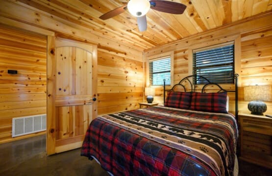 our cabin bedroom blends rustic elegance with modern comfort