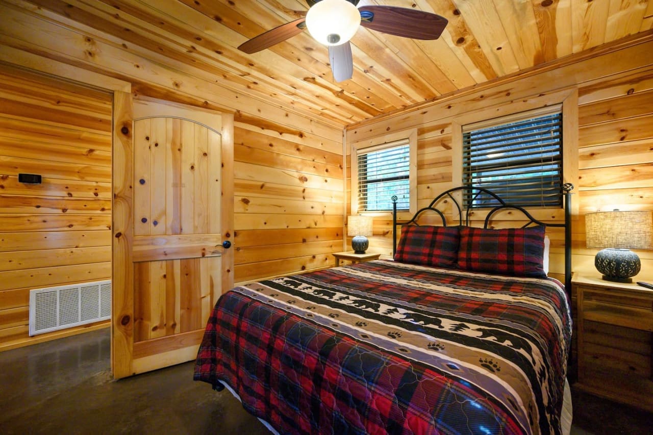our cabin bedroom blends rustic elegance with modern comfort