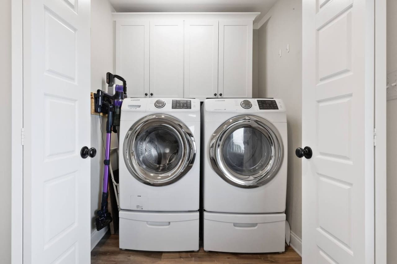 Washing Oasis: Enjoy the ease of doing laundry in our efficient and stylish laundry room.