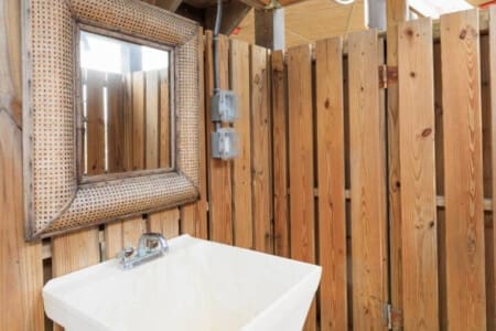 Modern Vanity: Combine functionality and sophistication with our basin and mirror setup.
