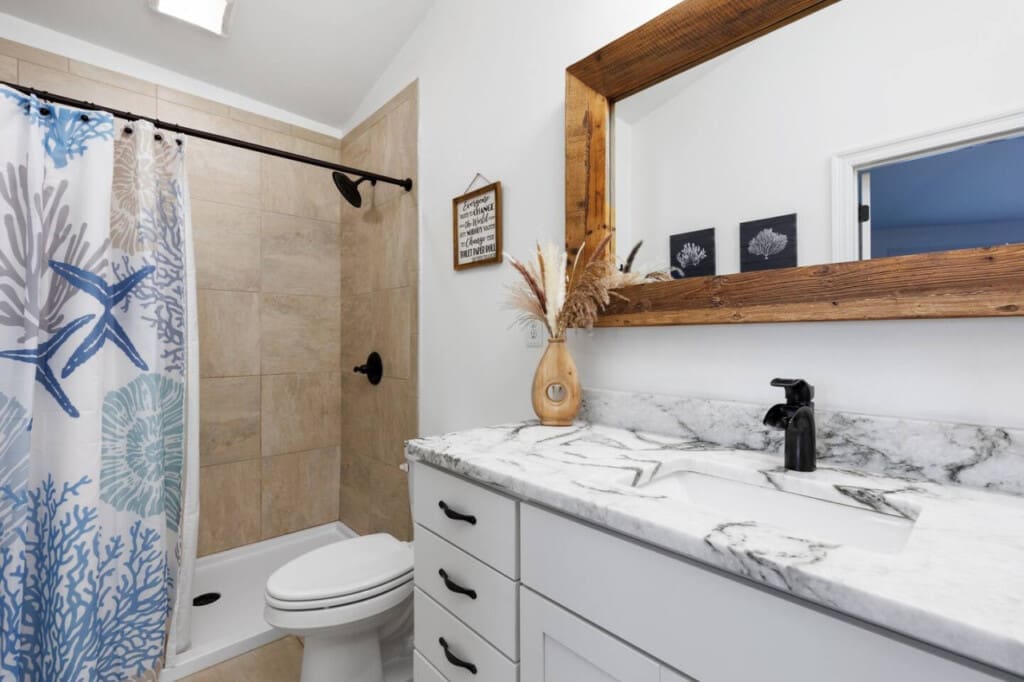 Colorful Statement: Infuse personality and charm with a vibrant shower curtain.