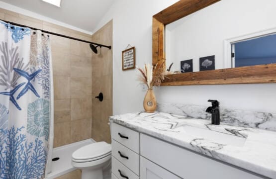 Colorful Statement: Infuse personality and charm with a vibrant shower curtain.