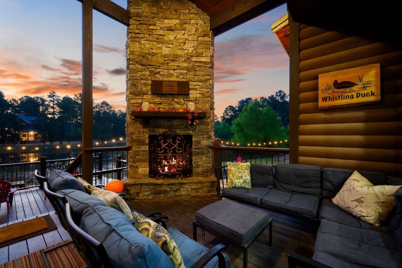 Cozy up by the stonewall fireplace—where rustic charm meets warm, comforting nights.